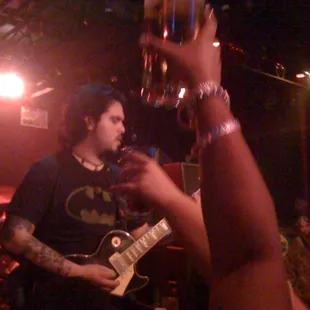 a man playing a guitar