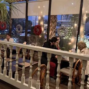 Interior photo looking onto sun porch seating