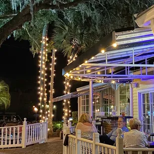 a view of the patio at night