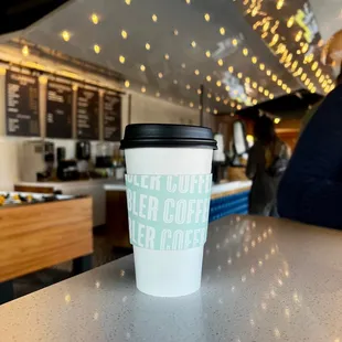 a coffee cup on a counter