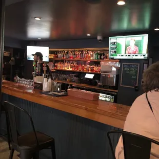 Bartender talking with the locals