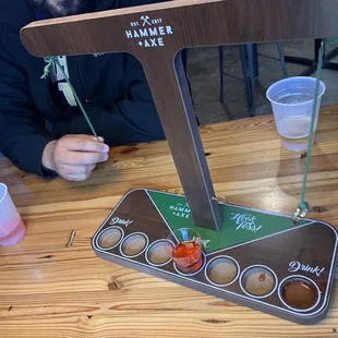 Fun game to play on one do the tables. Select the type of shot drink you'd like to use.