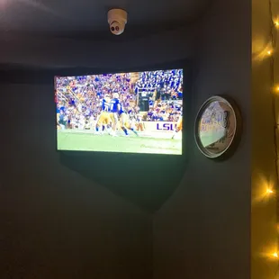 a television in the corner of a room