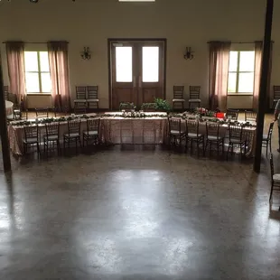 Blush Glitz Linens grace the head table of an elegant wedding at The Ranch at San Patricio