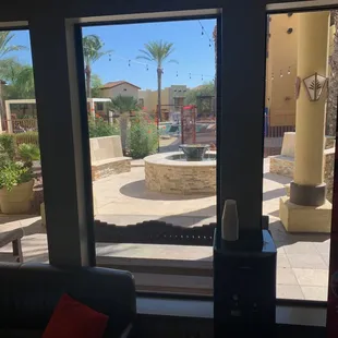 Courtyard at the office with a fire/water fountain and beautiful benches. #omnipools
