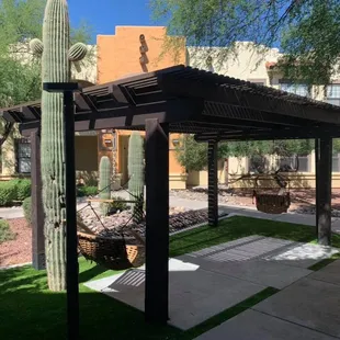 Pergolas and hanging chairs at the courtyards. #omnipools