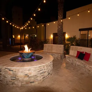 Brand new patio with water fountain fire pit.