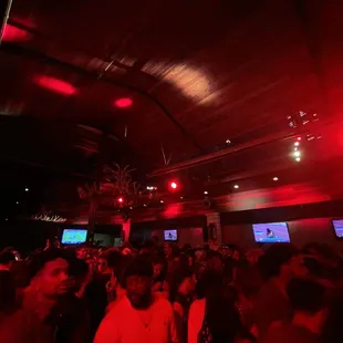 a crowd of people at a party