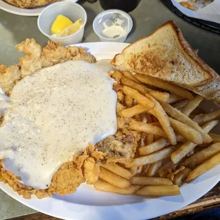 The large chicken fried steak with Fries and Texas Toast