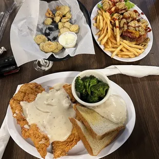 Chicken Fried Chicken, Angry Cheddar Burger fries and fried pickles.