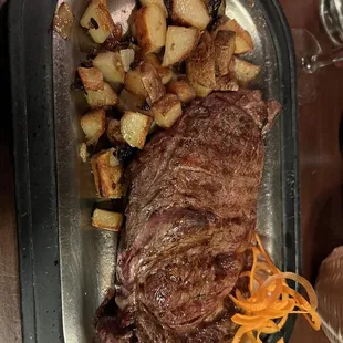 16 ounce ribeye with lyonnaise potatoes.