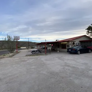 a car parked in front of it