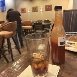 In the background, the server is aggressively sweeping up the bar floor while I&apos;m eating, with me being the only customer in the whole bar.