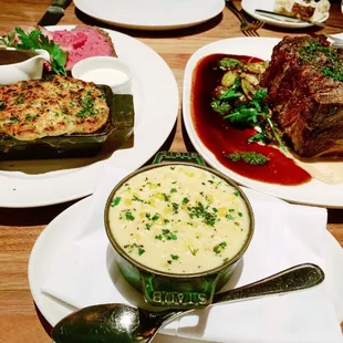 Prime rib with scalloped potatoes, Delmonico steak with potatoes, and cream of corn.