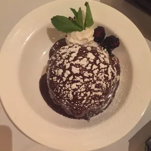 Wonderful vanilla ice cream covered in pecans and chocolate syrup