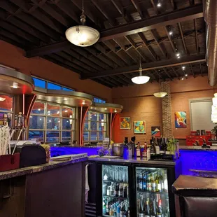 a view of the bar from the counter