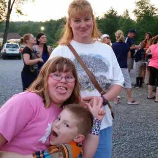 a woman holding a baby