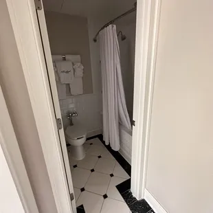 Powder room with deep tub.