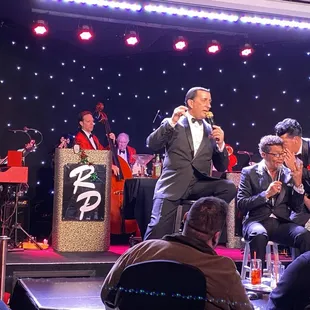 The band and the boys doing their thing