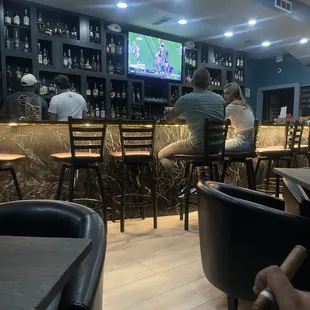 people sitting at the bar