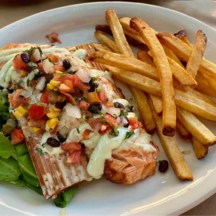 a plate of food with french fries