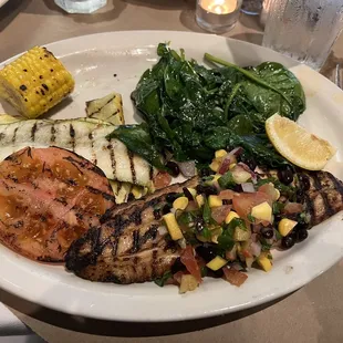 Grilled redfish, sautéed squash and spinach