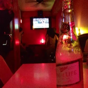 a bottle of beer on a table