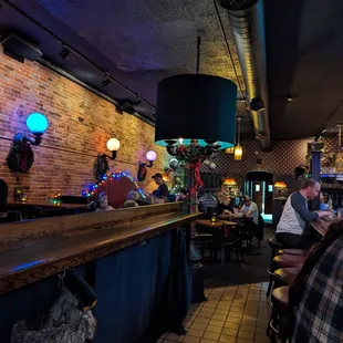 people sitting at the bar