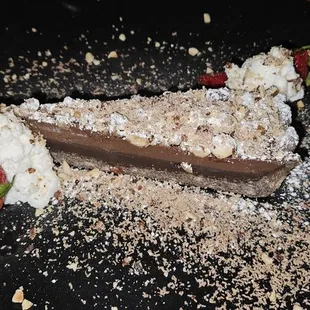 FERRERO ROCHER TORTE: Chocolate hazelnut, dark chocolate ganache.