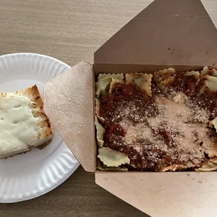 a piece of pizza and a piece of bread