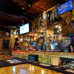 a bar with a wooden bar top