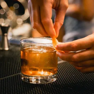 a bartender making a drink