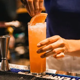 a bartender making a drink