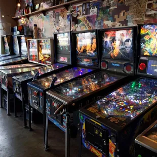 a row of pinball machines