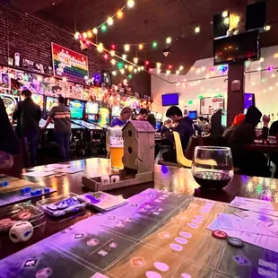 people playing a board game