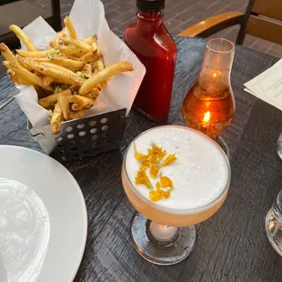 La Catrina and garlic fries