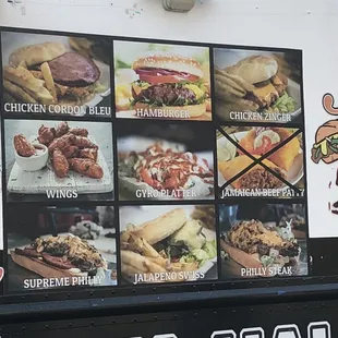 a menu on the side of a food truck