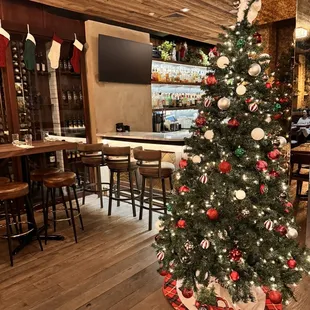 a christmas tree in the middle of the room