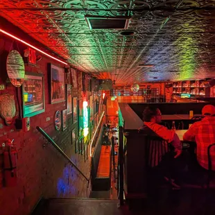 Looking down the stairs from the lounge into the gastropub/bar