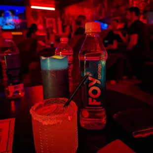 Mezcal margarita and bottled water, upstairs lounge