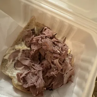 Old dried out grisly roast beef sandwich for $15 no thank you