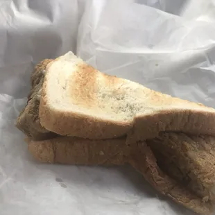 a piece of bread and a piece of meat