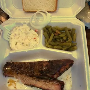 BBQ ribs, potato salad and green beans.