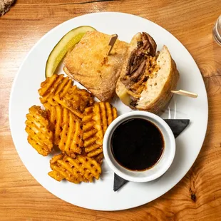 a plate of food with fries and a sandwich