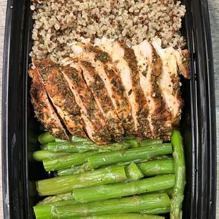 a meal of chicken, rice and asparagus