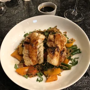 Miso glazed white fish o a bed of wasabi noodles