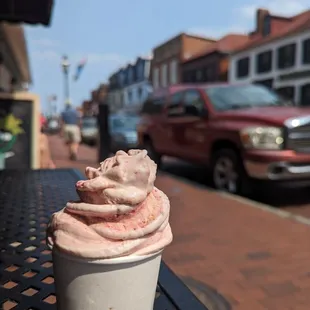 a cup of ice cream on a table