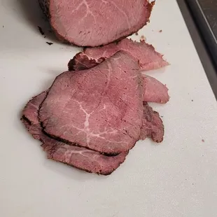 a piece of meat on a cutting board