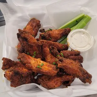 chicken wings in a styrofoam container