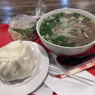 A6. Steamed Pork Bun and P1. Rare Eye Round Steak Pho (Ph Ti)